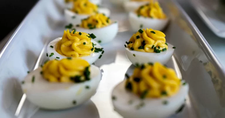 Savor the Heat With Spicy Deviled Eggs, a Tantalizing Blend of Chili Powder, Anchovy Paste, and Butter. Perfect Appetizer Delight.