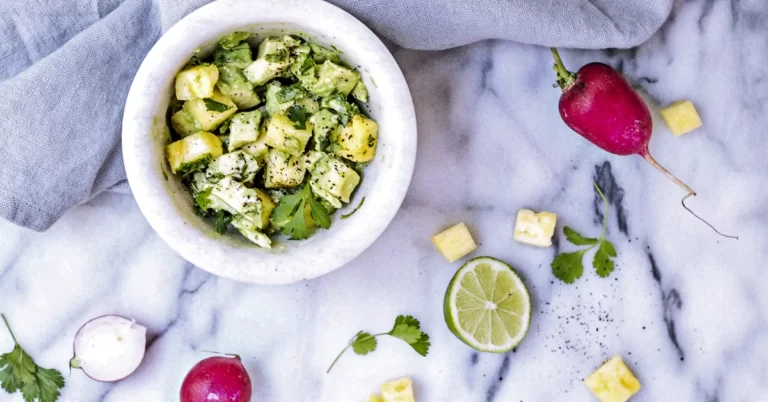 Savor the Joy of a Vibrant Vegetarian Potato Salad, a Delightful Blend of Fresh Vegetables and Zesty Vinaigrette.