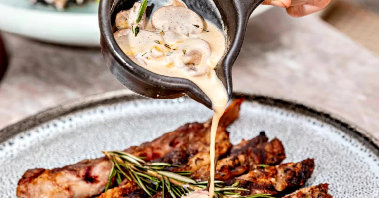 Savor the Richness of Homemade White Mushroom Sauce—a Velvety Blend of Flour, Stock, Cheese, and Sour Cream. Perfect for Meats.
